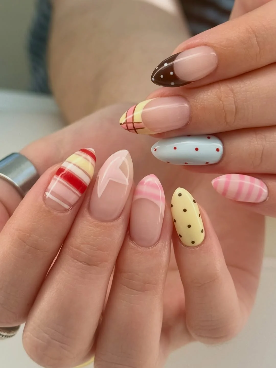 june nails ideas 2026 Retro Mixed Print Nails With Playful Vintage Vibes