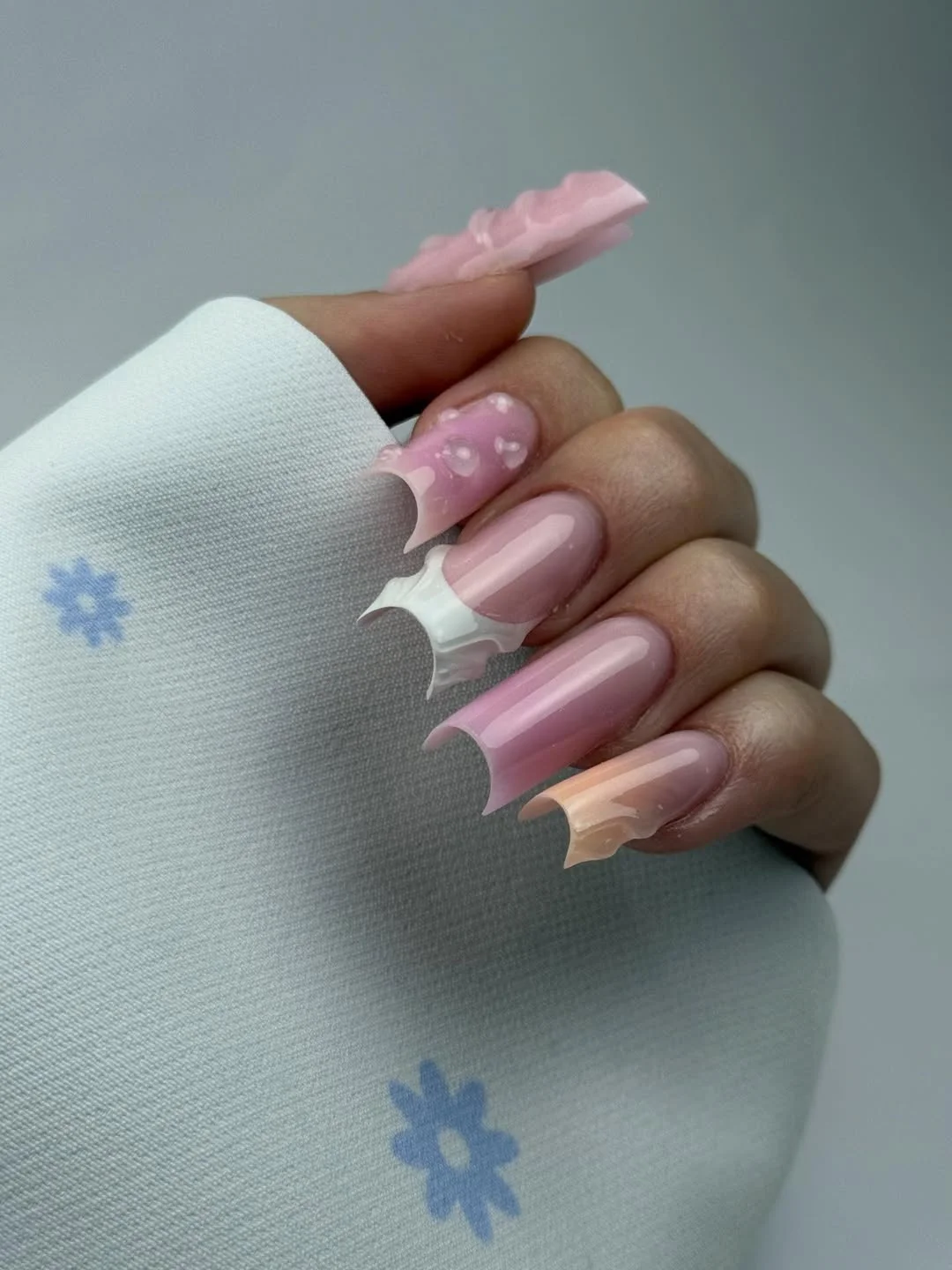 june nails ideas 2026 Soft Pink Sculpted Nails With Y2K Fantasy Energy