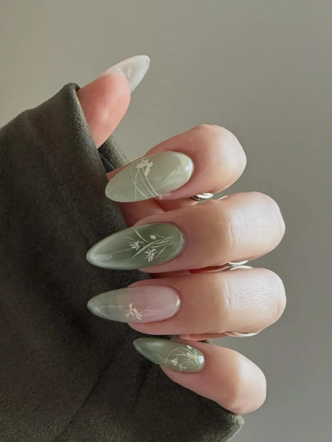 june nails ideas 2026 Muted Sage Botanical Nails for a Calm June Aesthetic