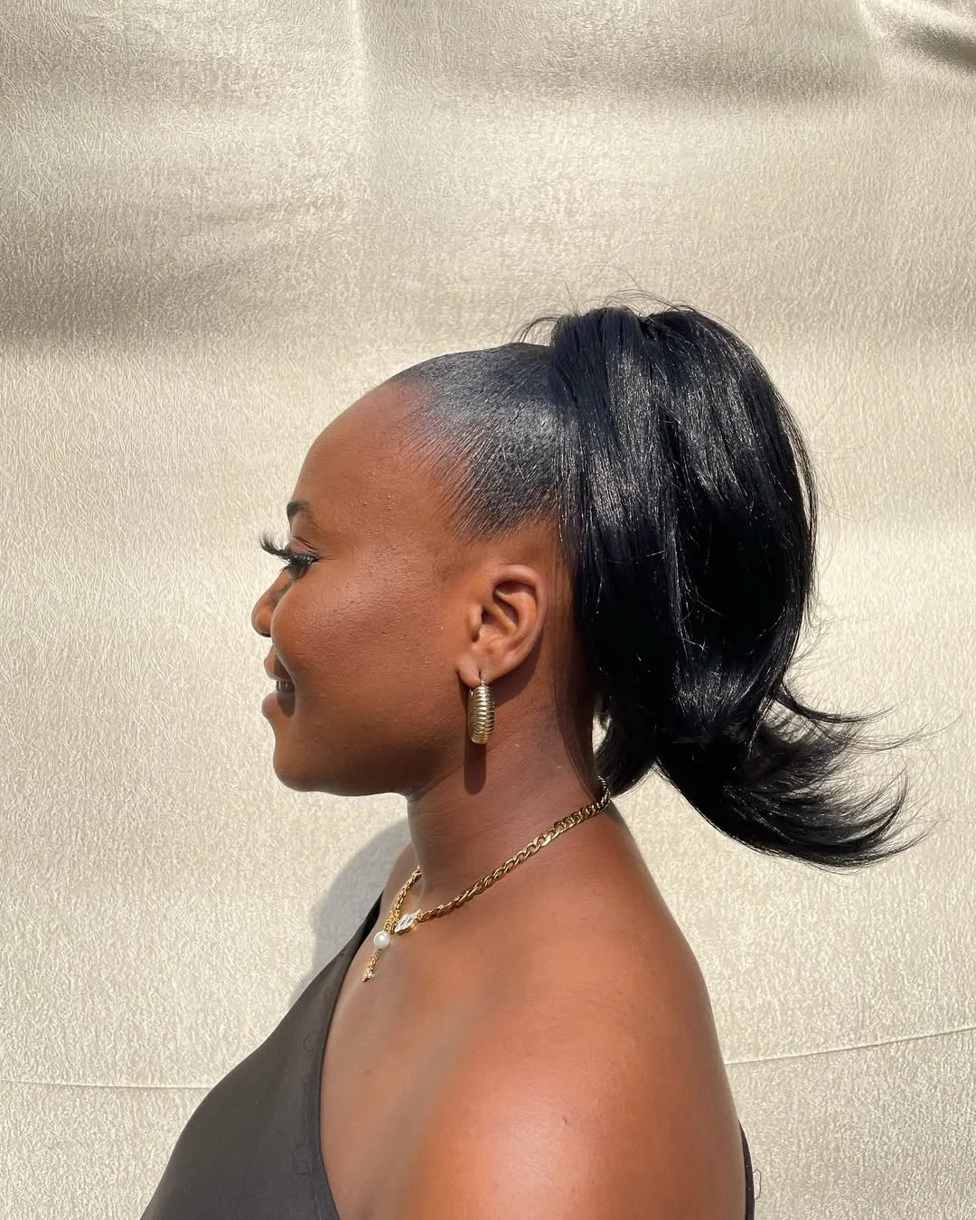 messy summer ponytail hairstyle 2026 Sculpted Flipped Ponytail With Minimalist Summer Energy