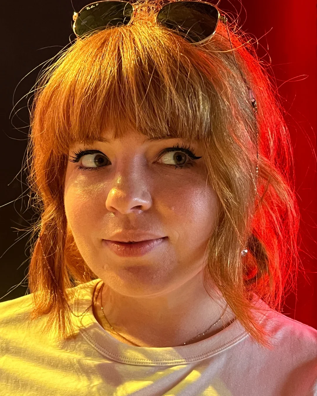 modern summer auburn hair color 2026 Soft Ginger Fringe With Indie Summer Energy