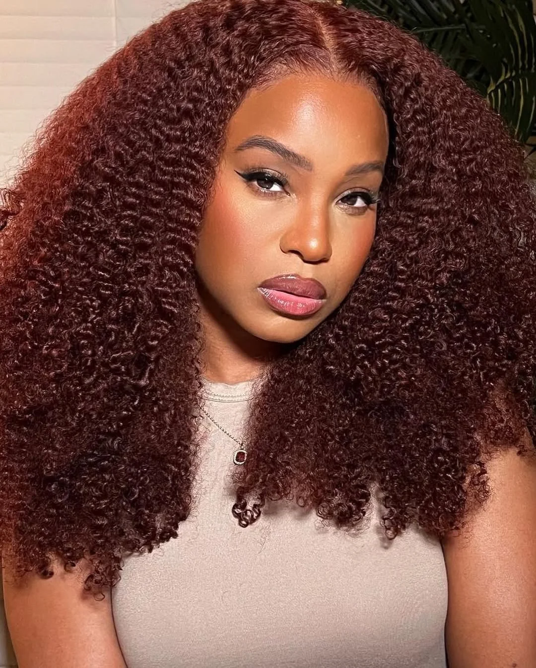 modern summer auburn hair color 2026 Deep Auburn Curls With Espresso Dimension