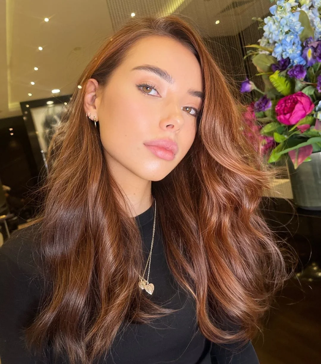 modern summer auburn hair color 2026 Velvet Auburn Waves With Luxe Brunette Glow
