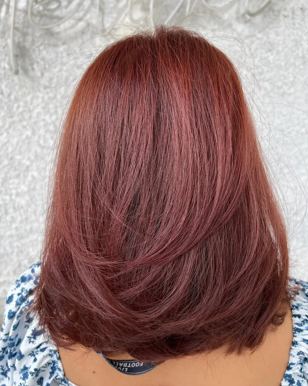 modern summer auburn hair color 2026 Muted Berry Auburn With Soft Layered Movement