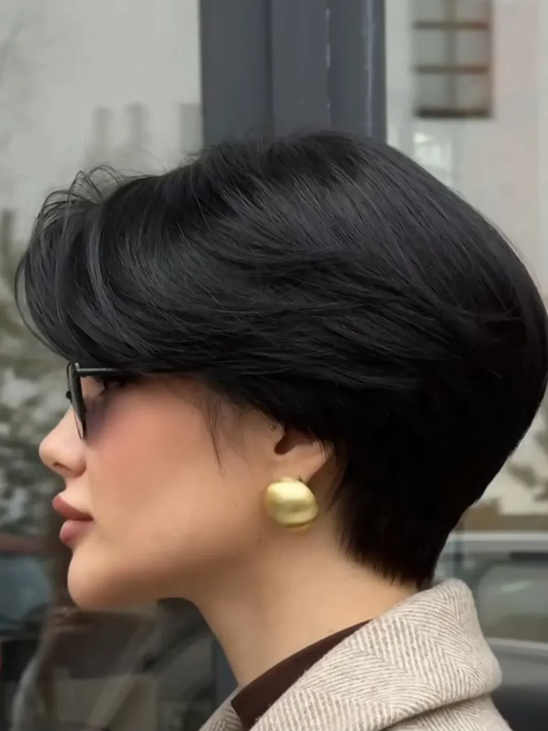 must-try summer haircut 2026 Sleek Sculpted Short Bob with Tucked Volume