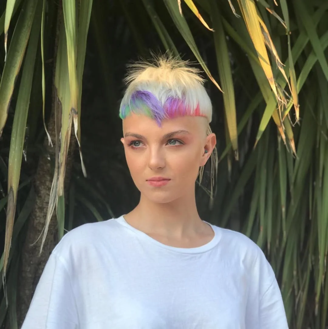 must-try summer haircut 2026 Edgy Micro Fringe Pixie with Creative Color