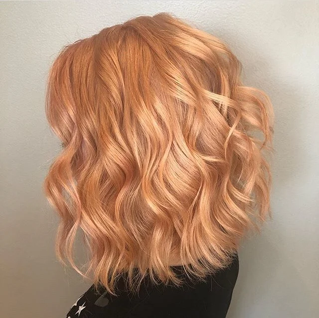 must-try summer haircut 2026 Soft Peachy Wavy Lob with Airy Texture