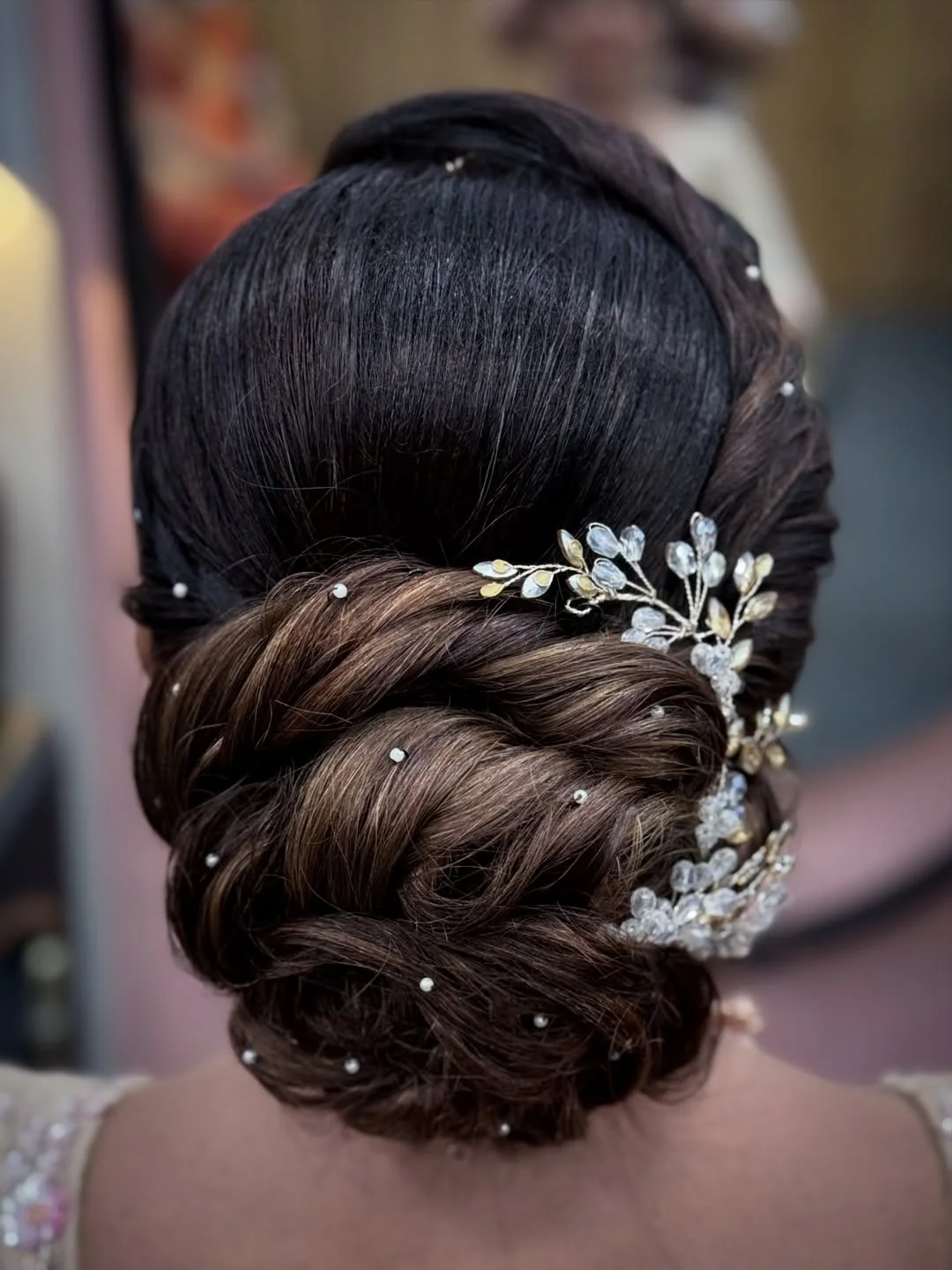 natural summer bun hairstyles 2026 Crystal Woven Low Bun With Bridal Softness
