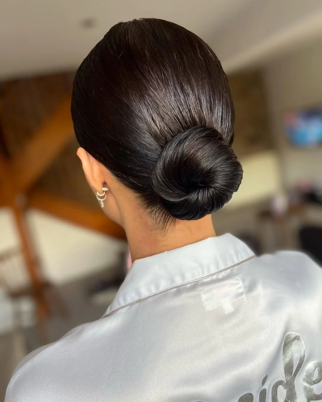 natural summer bun hairstyles 2026 Sleek Espresso Low Bun That Feels Expensive