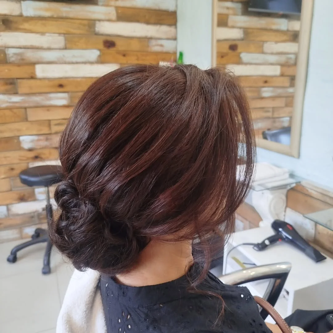 natural summer bun hairstyles 2026 Soft Textured Bun With Effortless Volume