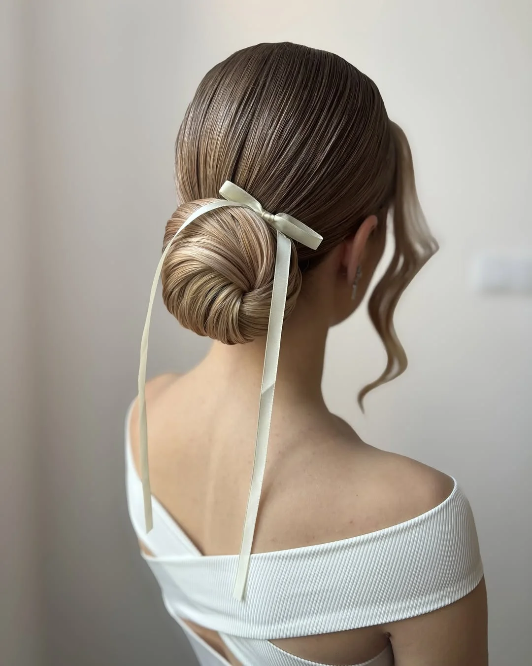 natural summer bun hairstyles 2026 Ribbon Wrapped Ballet Bun With Quiet Luxury Energy