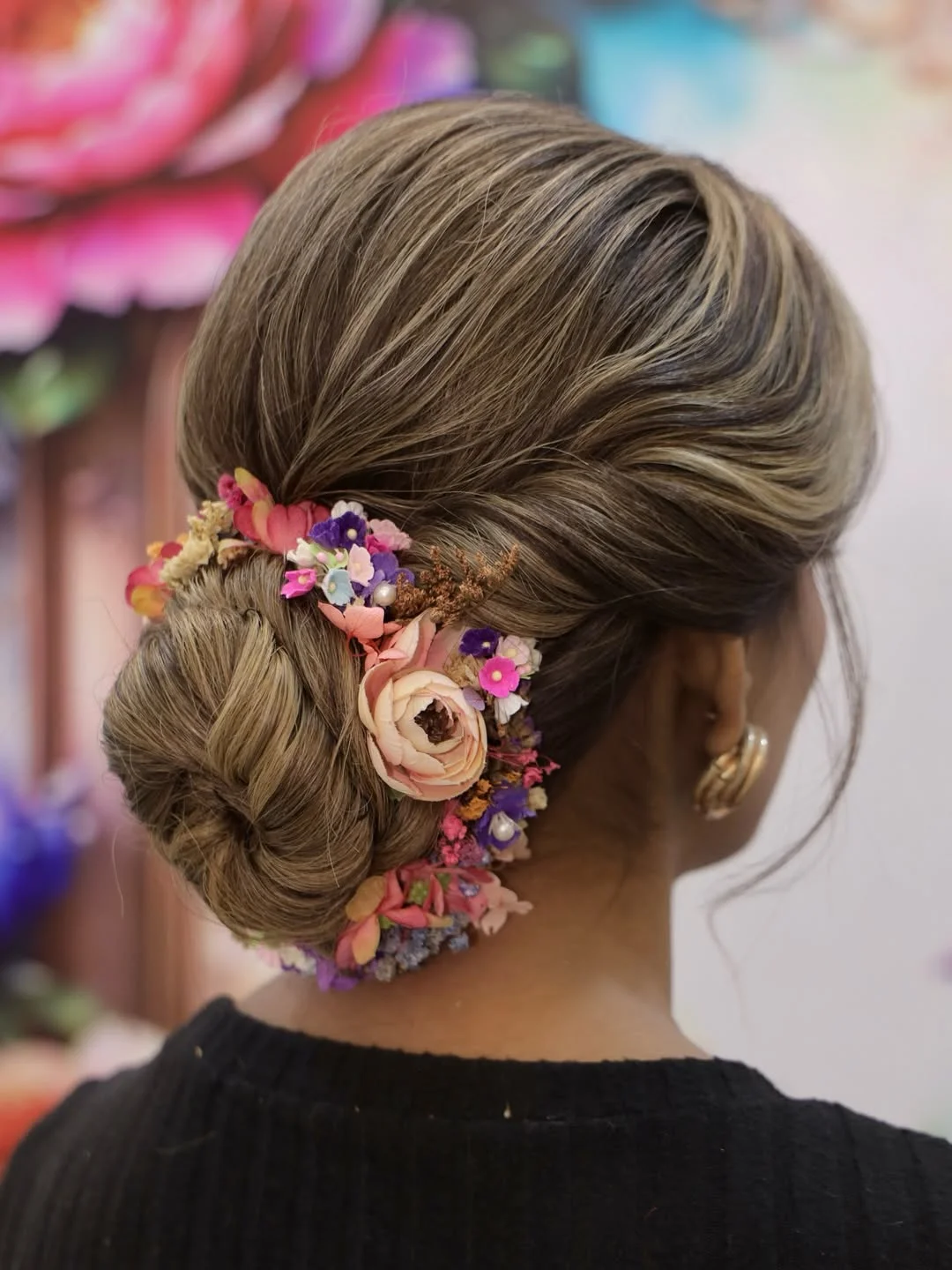natural summer easy hairstyle 2026 Floral Low Bun With Soft Summer Romance