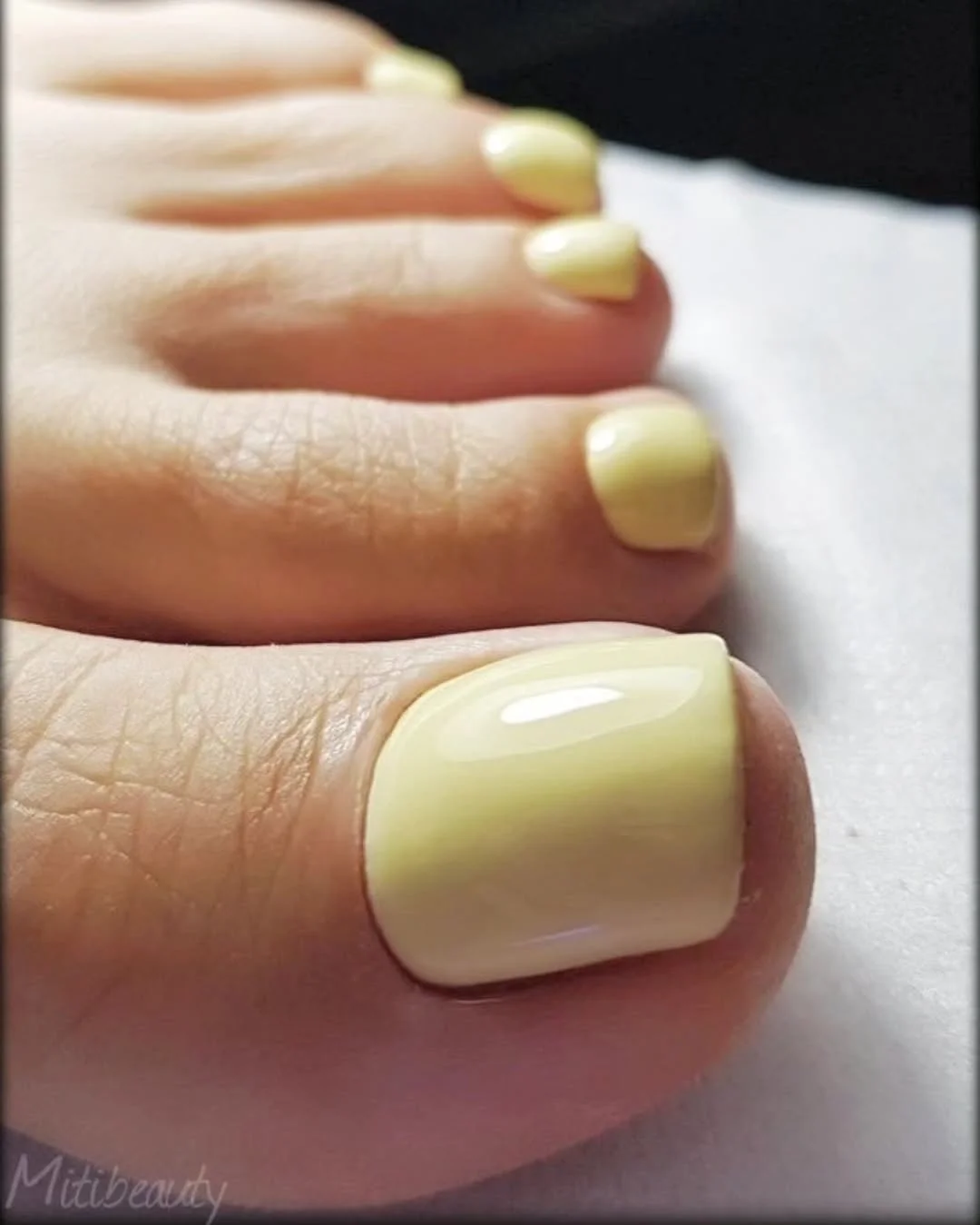 pedicure ideas - summer trends 2026 Pastel Butter Yellow Pedicure Becoming The Unexpected Neutral Of 2026