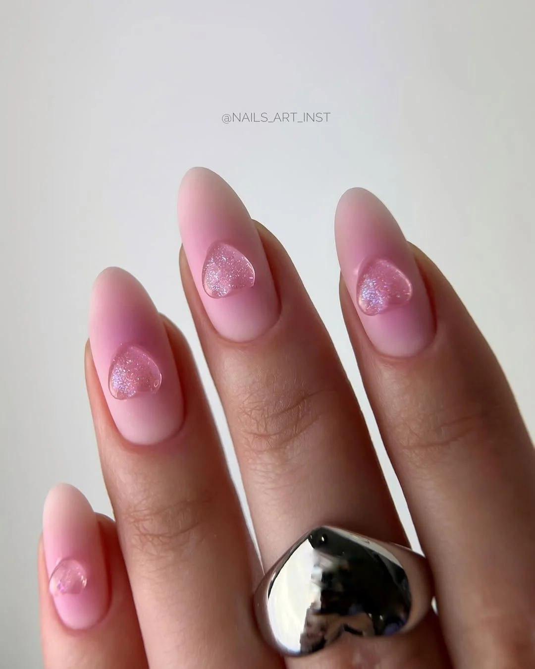 pink summer nails 2026 Soft Matte Pink Nails with Crystal Heart Details