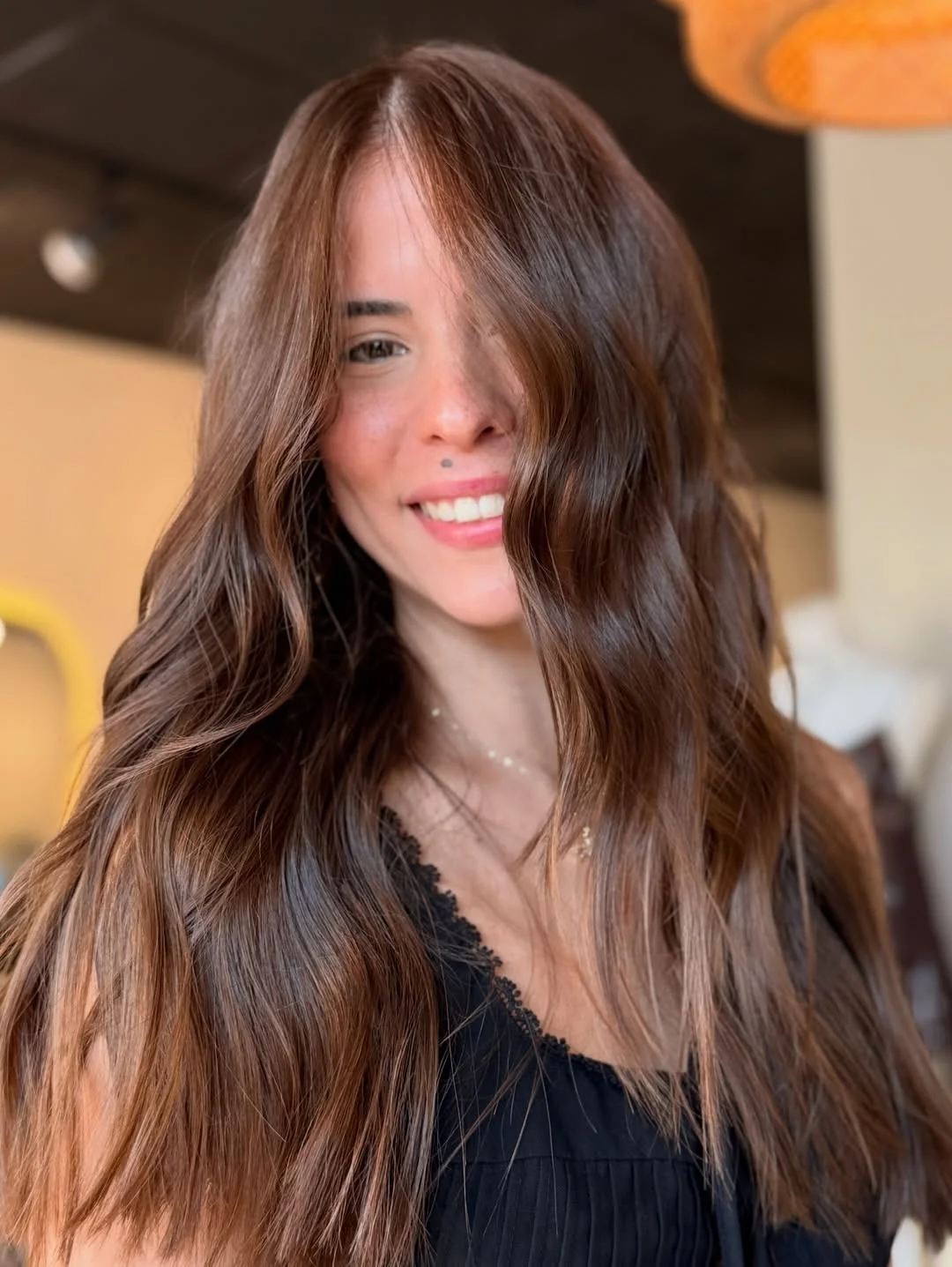 summer hair color ideas to inspire you 2026 Warm chestnut glow with natural softness