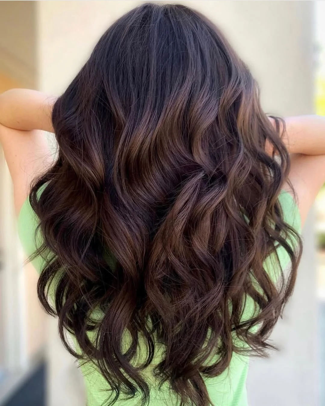 summer hair color ideas to inspire you 2026 Deep cocoa waves with rich reflective depth
