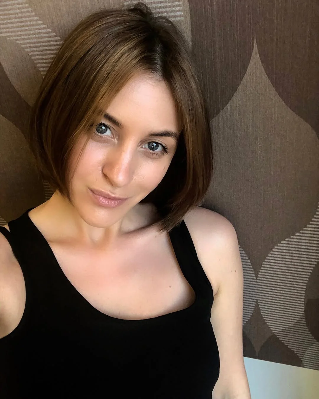 summer hair color ideas to inspire you 2026 Sleek classic bob with natural dimension