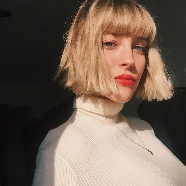 pretty summer honey blonde hair color 2026 Blunt Honey Blonde Bob With Parisian Edge