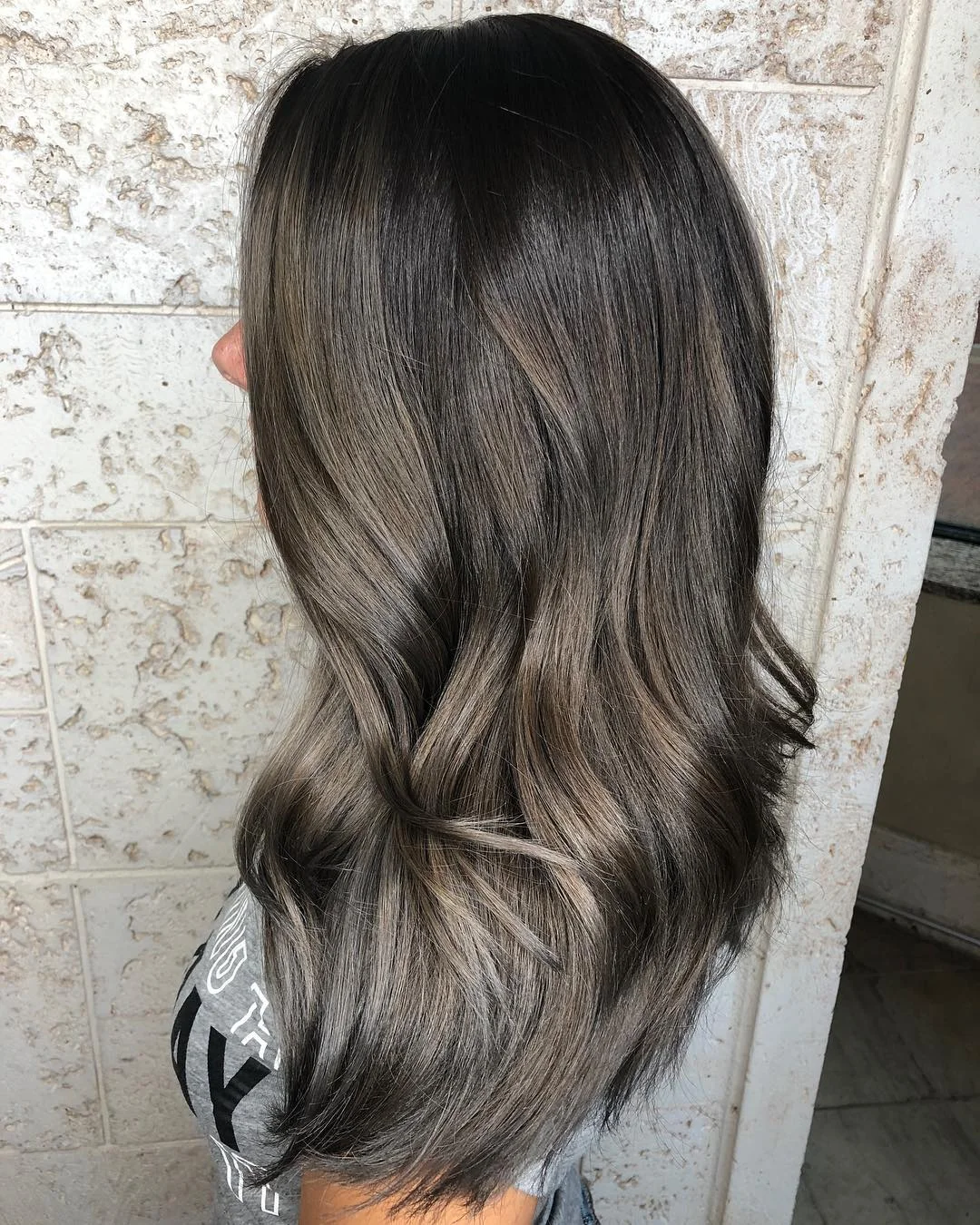 pretty summer mushroom brown hair color 2026 Soft blended waves with smoky brunette depth