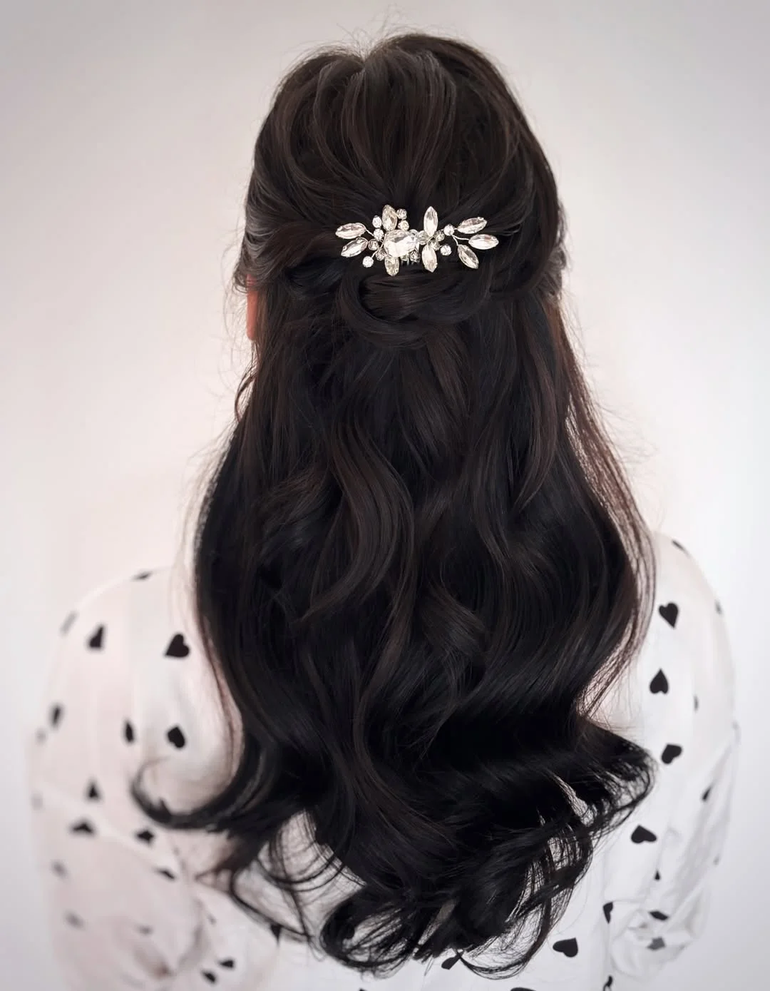 refined summer wedding guest hairstyles 2026 Soft Hollywood Waves With Crystal Half-Up Twist