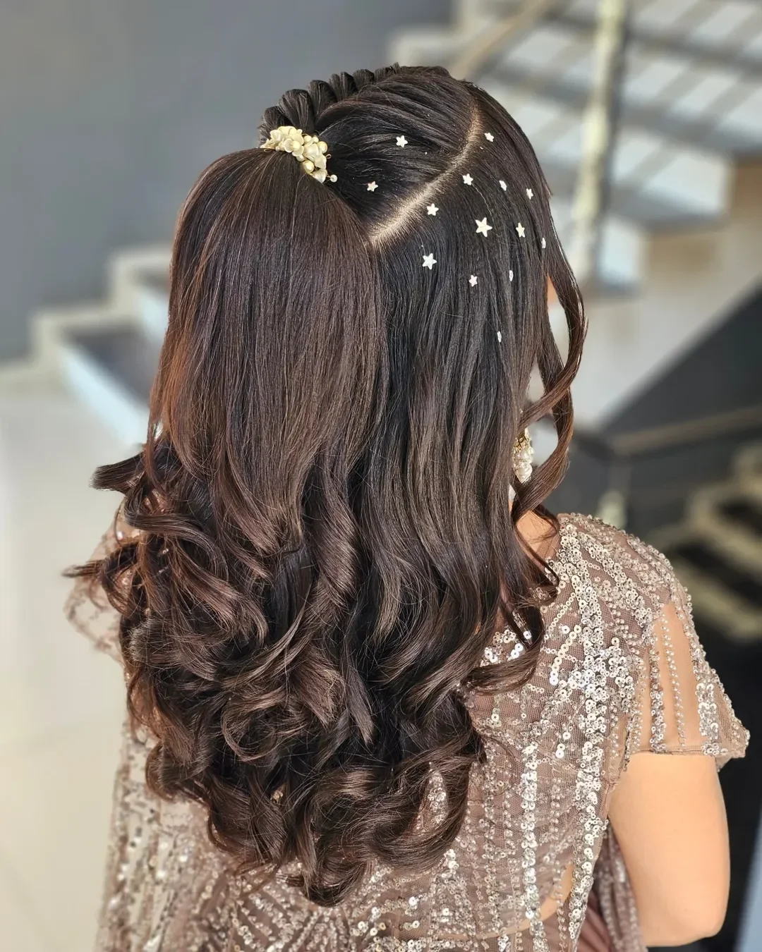 refined summer wedding guest hairstyles 2026 Playful Half Ponytail With Starry Details