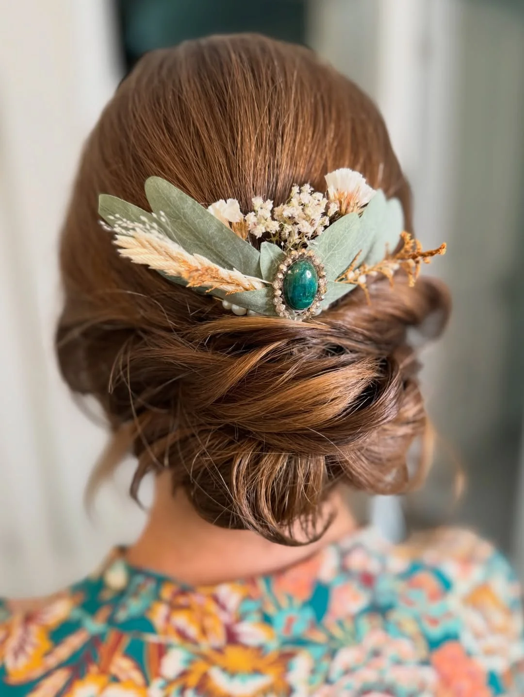 refined summer wedding guest hairstyles 2026 Bohemian Low Twist With Botanical Accessories