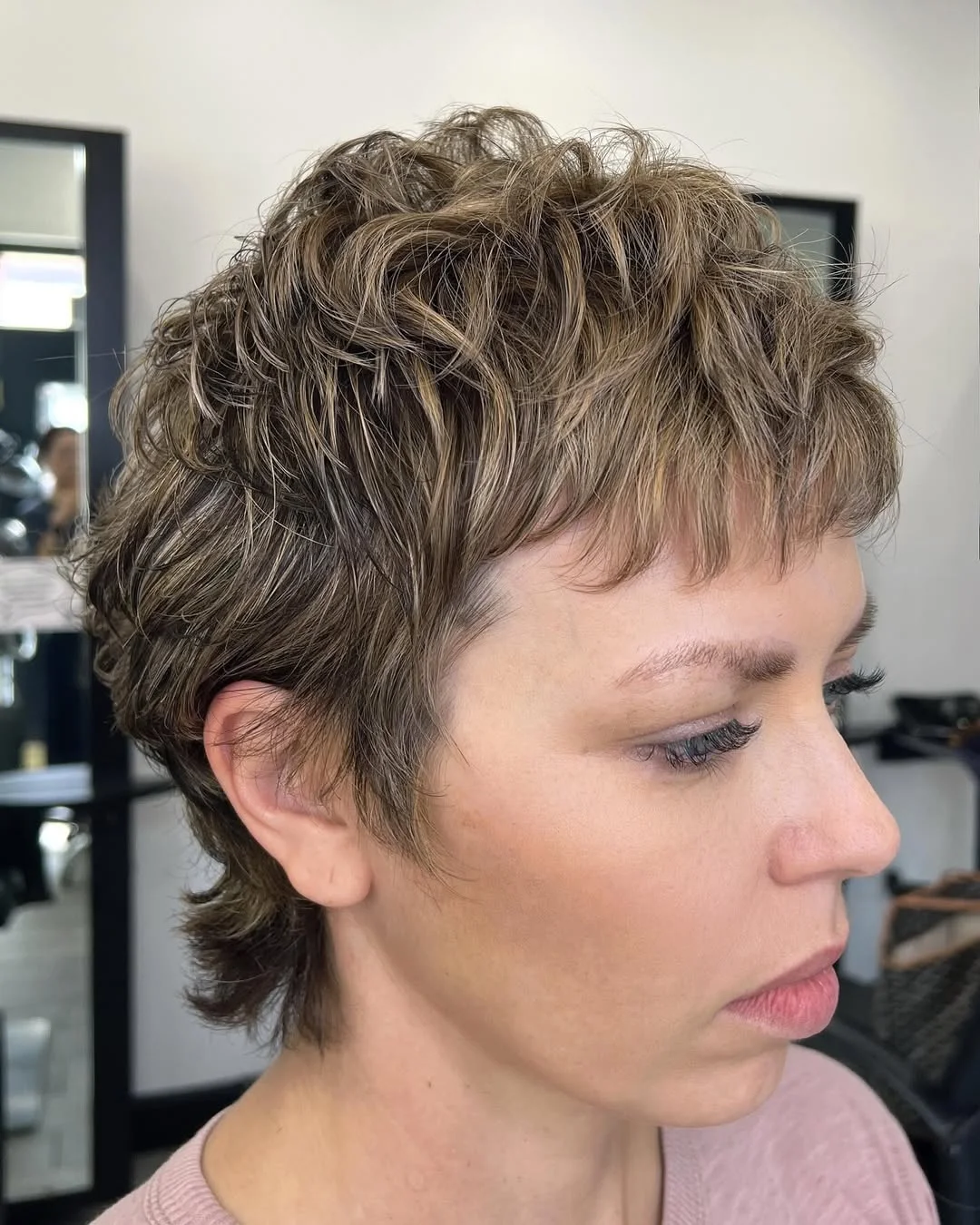 salon summer short haircuts 2026 Soft Feathered Pixie Mullet With Airy Layers