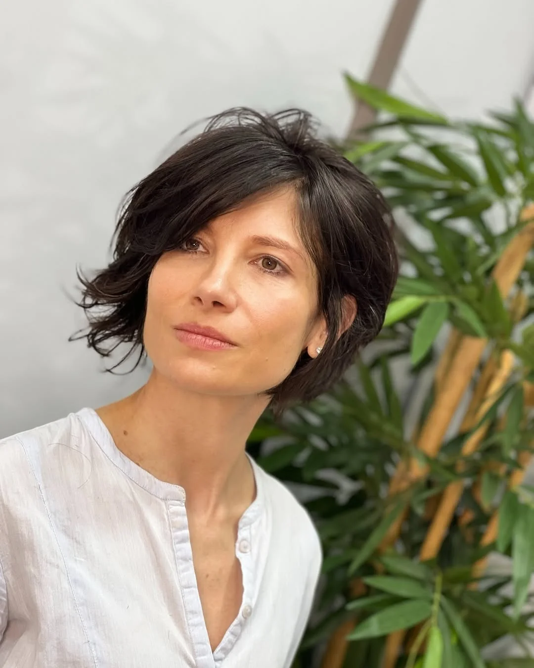 salon summer short haircuts 2026 Soft Side-Swept Parisian Bob With Wispy Texture
