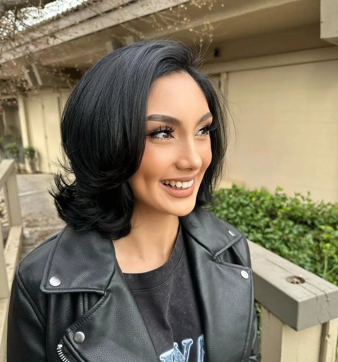salon summer short haircuts 2026 Voluminous Layered Flip Bob With Vintage Energy
