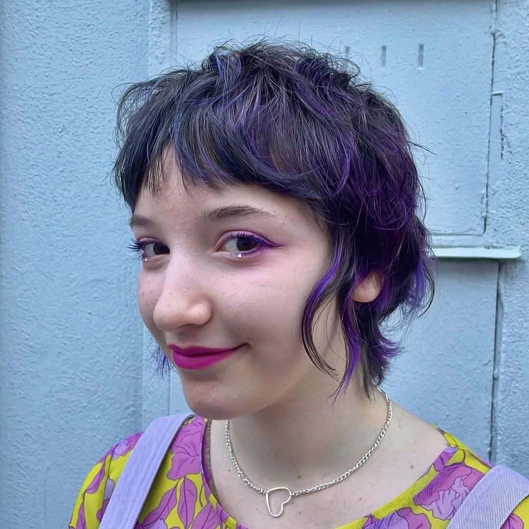 salon summer short haircuts 2026 Playful Purple Pixie Shag With Festival Texture
