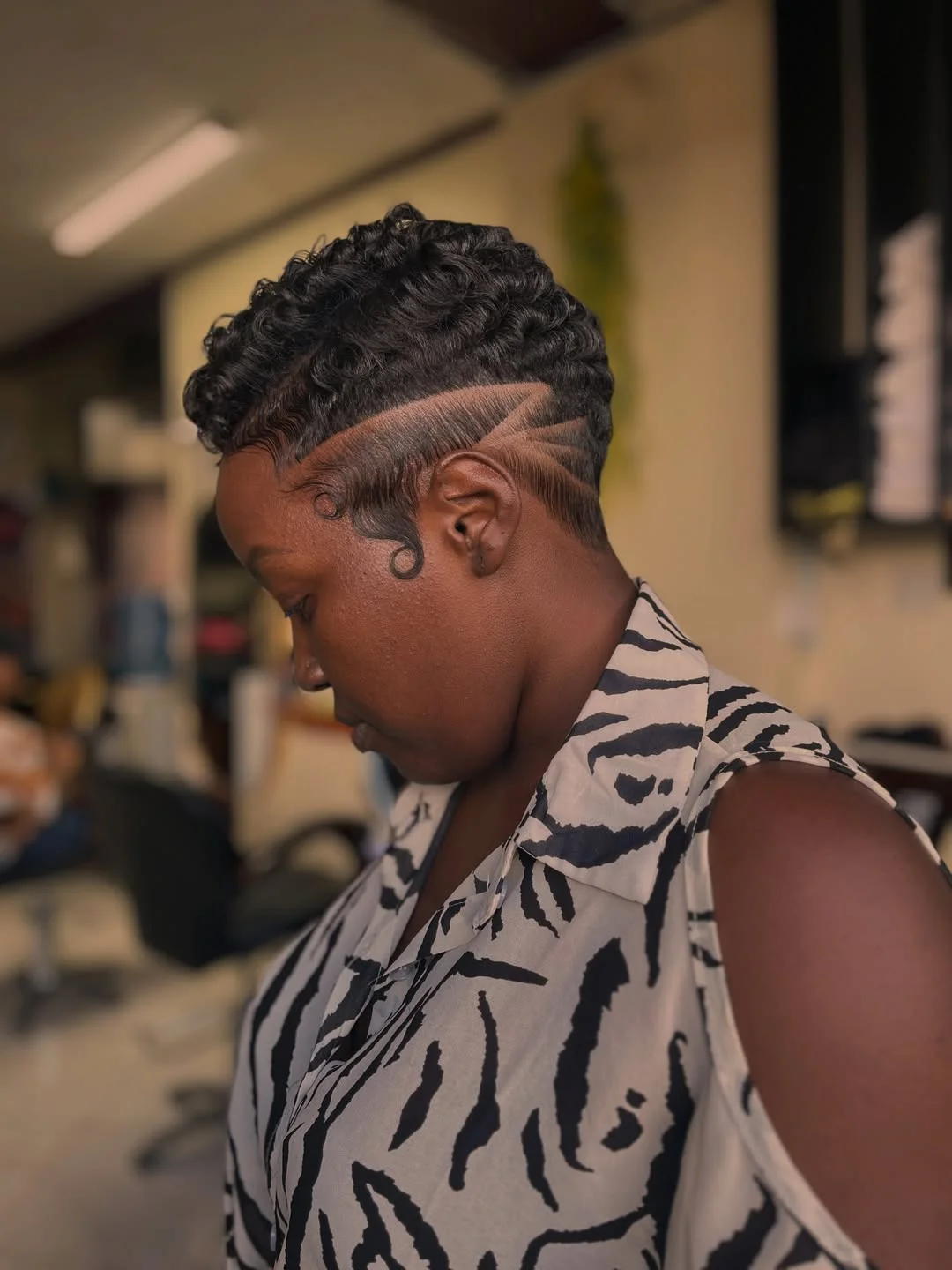salon summer short hairstyles 2026 Precision Curly Fade With Artistic Lines