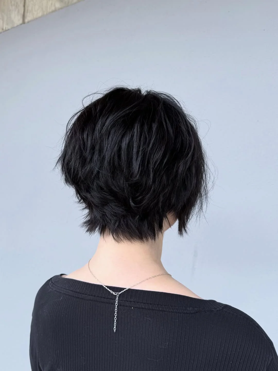 salon summer short hairstyles 2026 Layered Midnight Bob With Airy Texture