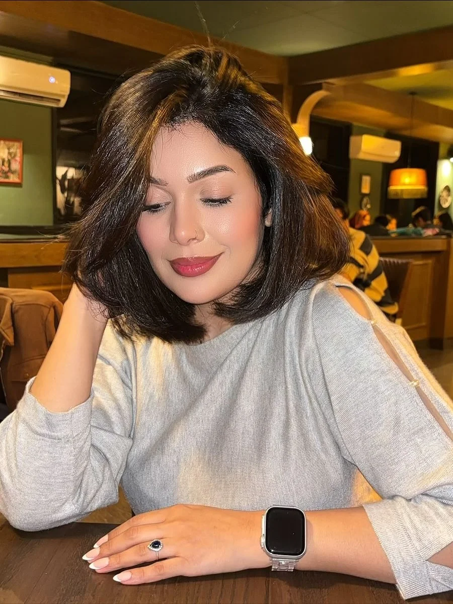 salon summer short hairstyles 2026 Glossy Parisian Bob With Side Sweep