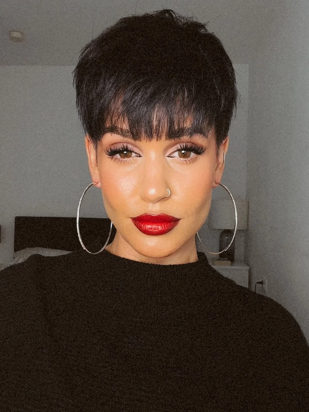 salon summer short hairstyles 2026 Classic Dark Pixie With Full Fringe Drama