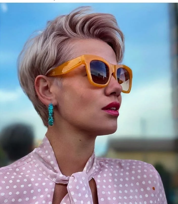 salon summer short hairstyles 2026 Polished Ice Blonde Pixie With Riviera Energy