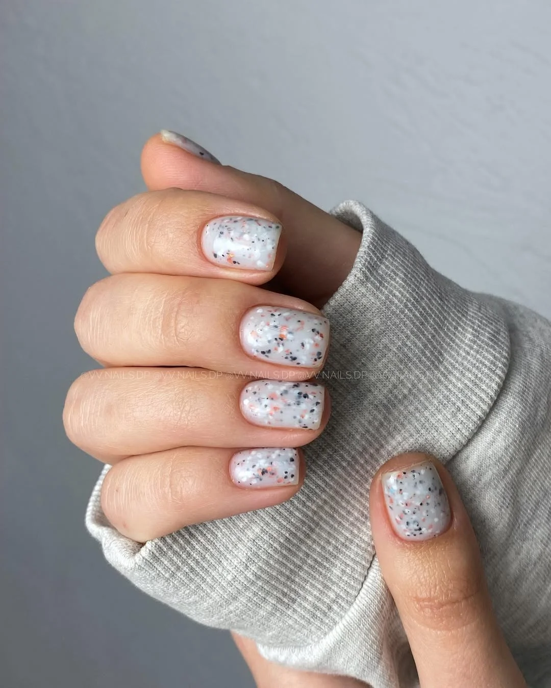 short gel nails summer 2026 Milky Speckled Nails Inspired by Minimalist Beauty Trends