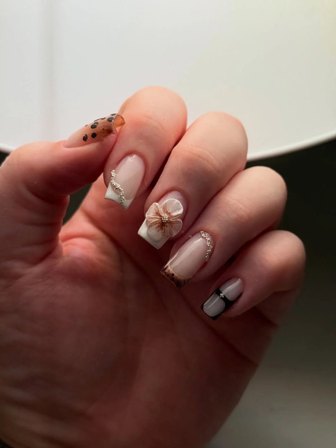 short gel nails summer 2026 Elegant Neutral Floral Nails With Soft Bridal Details