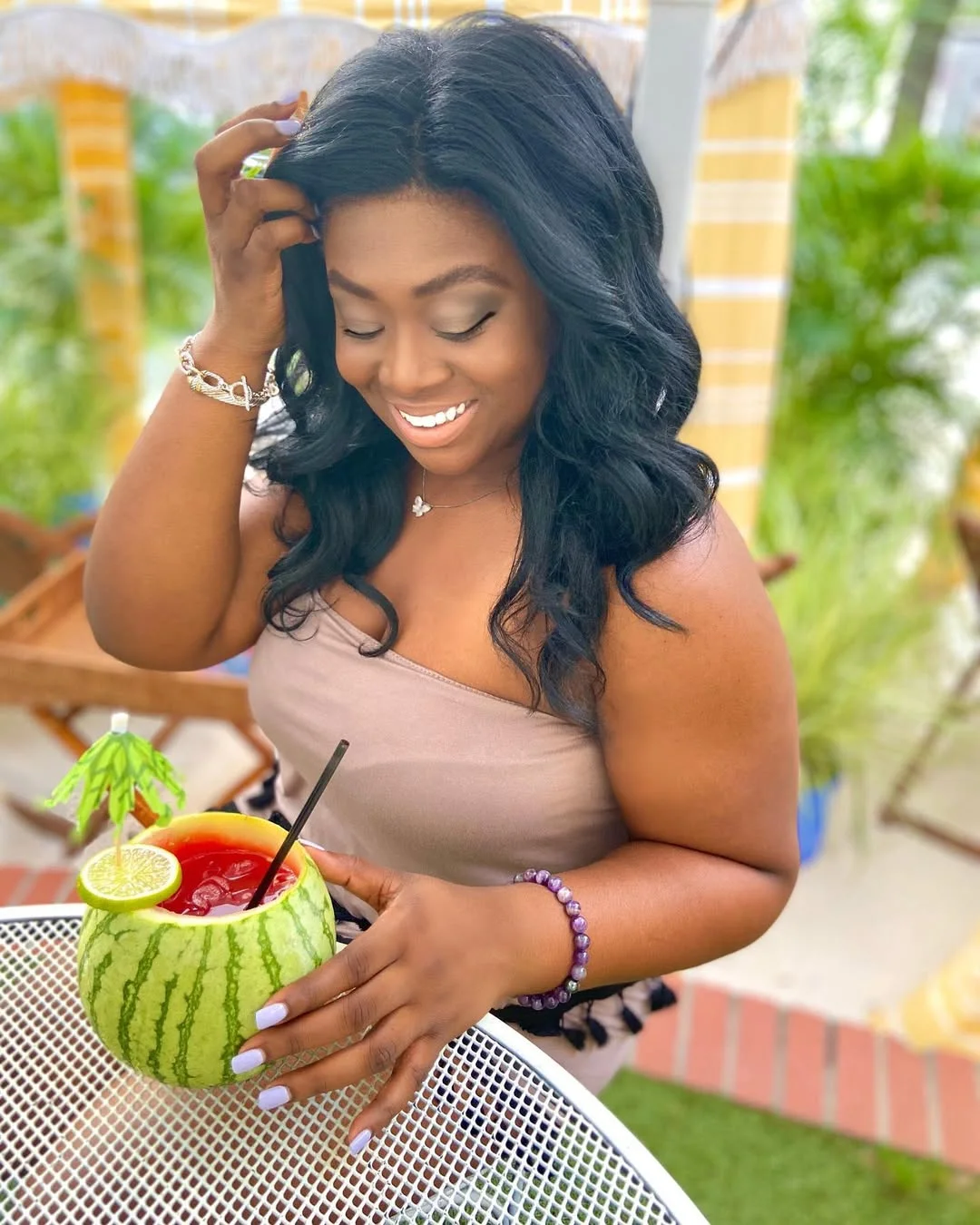 sleek summer hairstyle black women 2026 Soft Black Glam Curls With Vacation Elegance