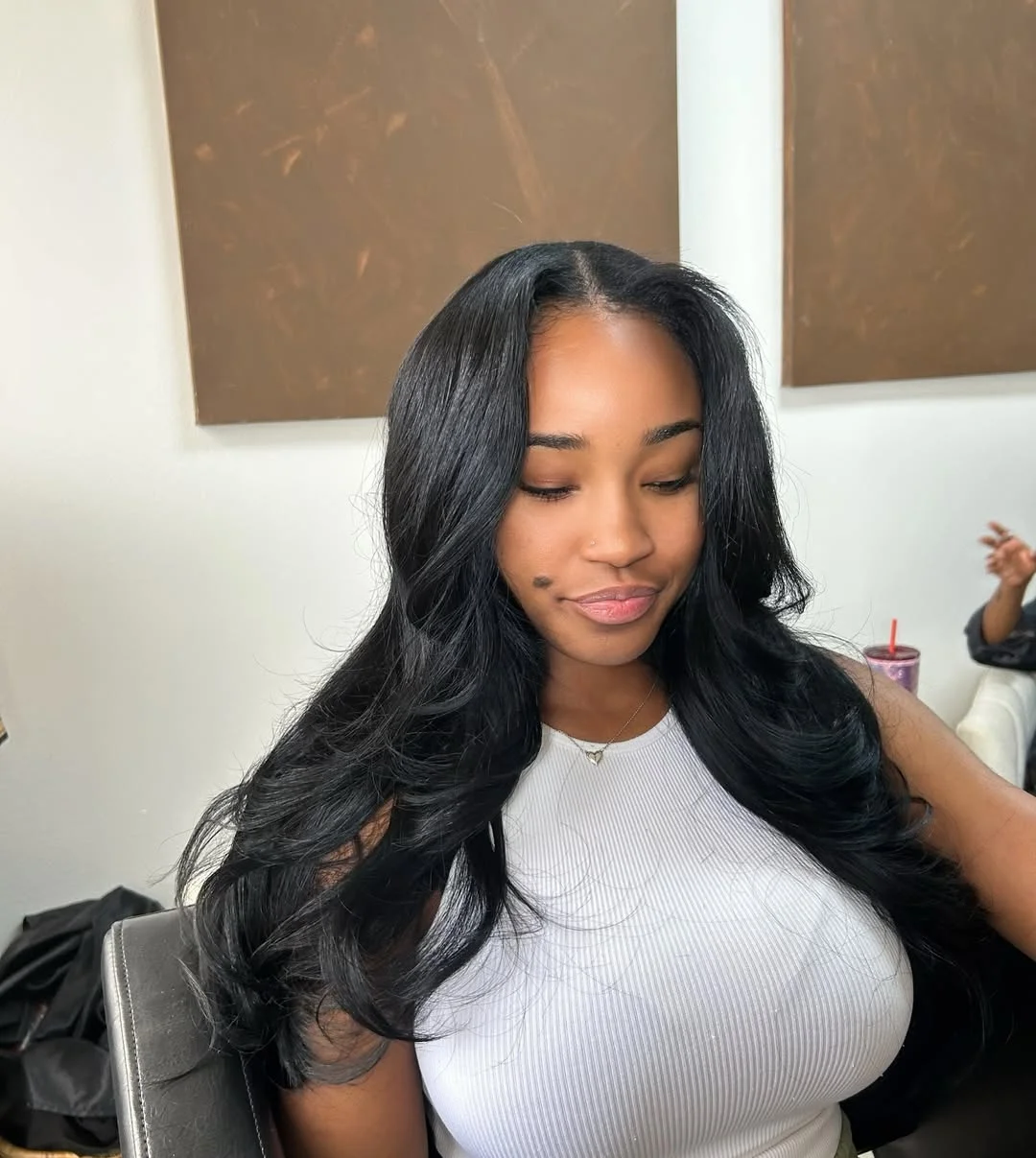 sleek summer hairstyle black women 2026 Jet Black Blowout Waves With Luxe Body