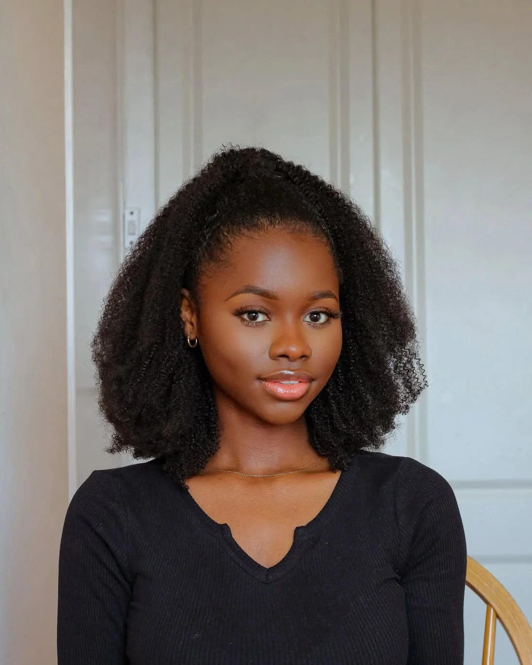 sleek summer hairstyle black women 2026 Half-Up Natural Volume With Soft Curly Definition