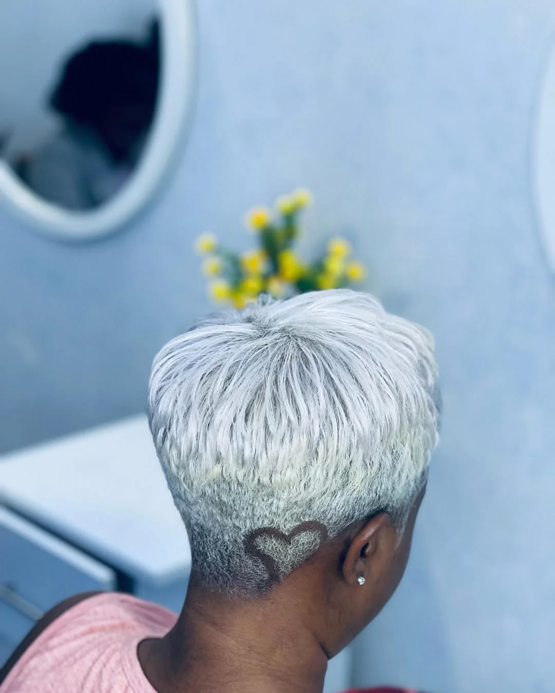 sleek summer hairstyle black women 2026 Platinum Bowl Crop With Hidden Heart Details