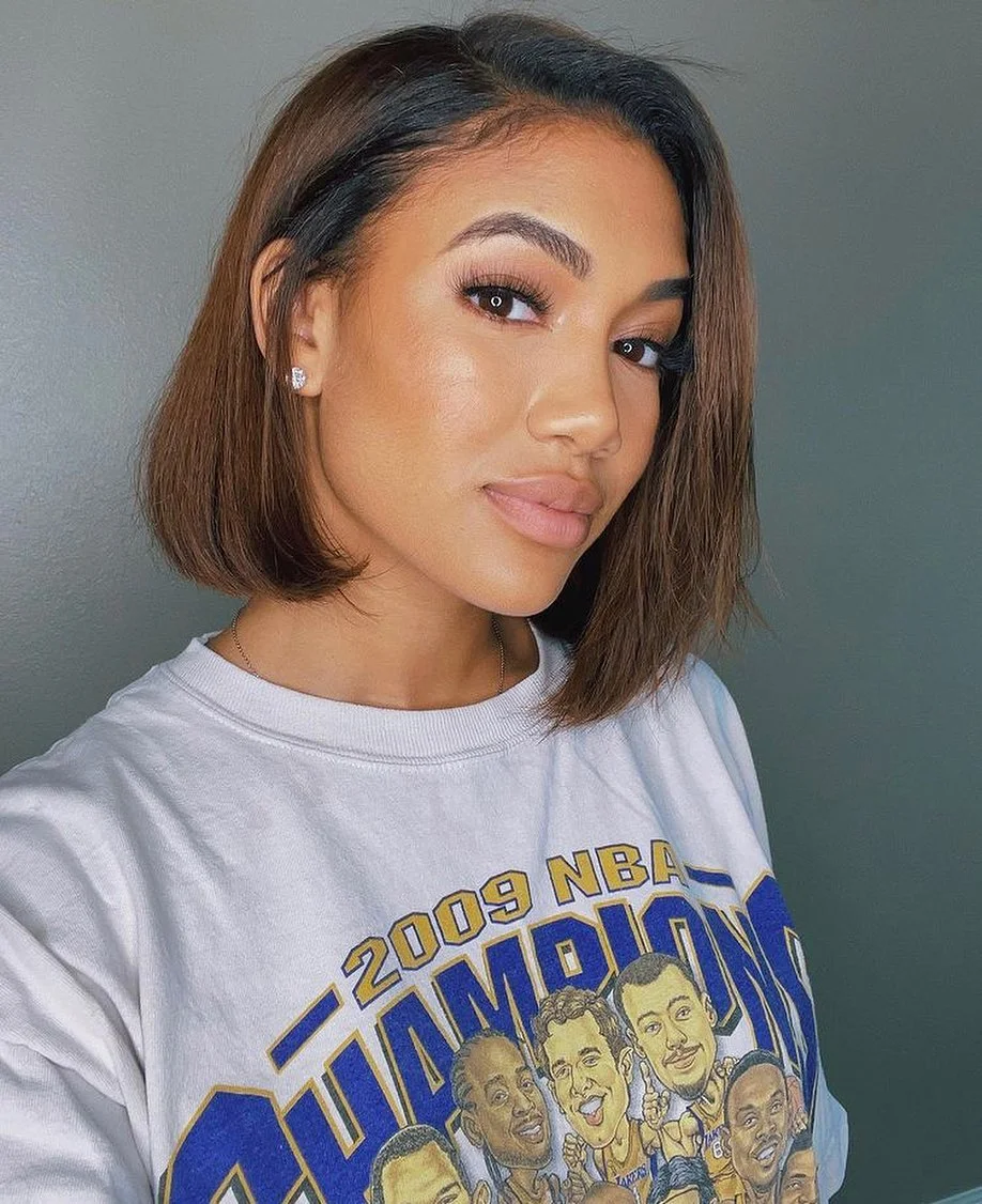 sleek summer hairstyle black women 2026 Soft Cocoa Bob With a Glossy Side Part