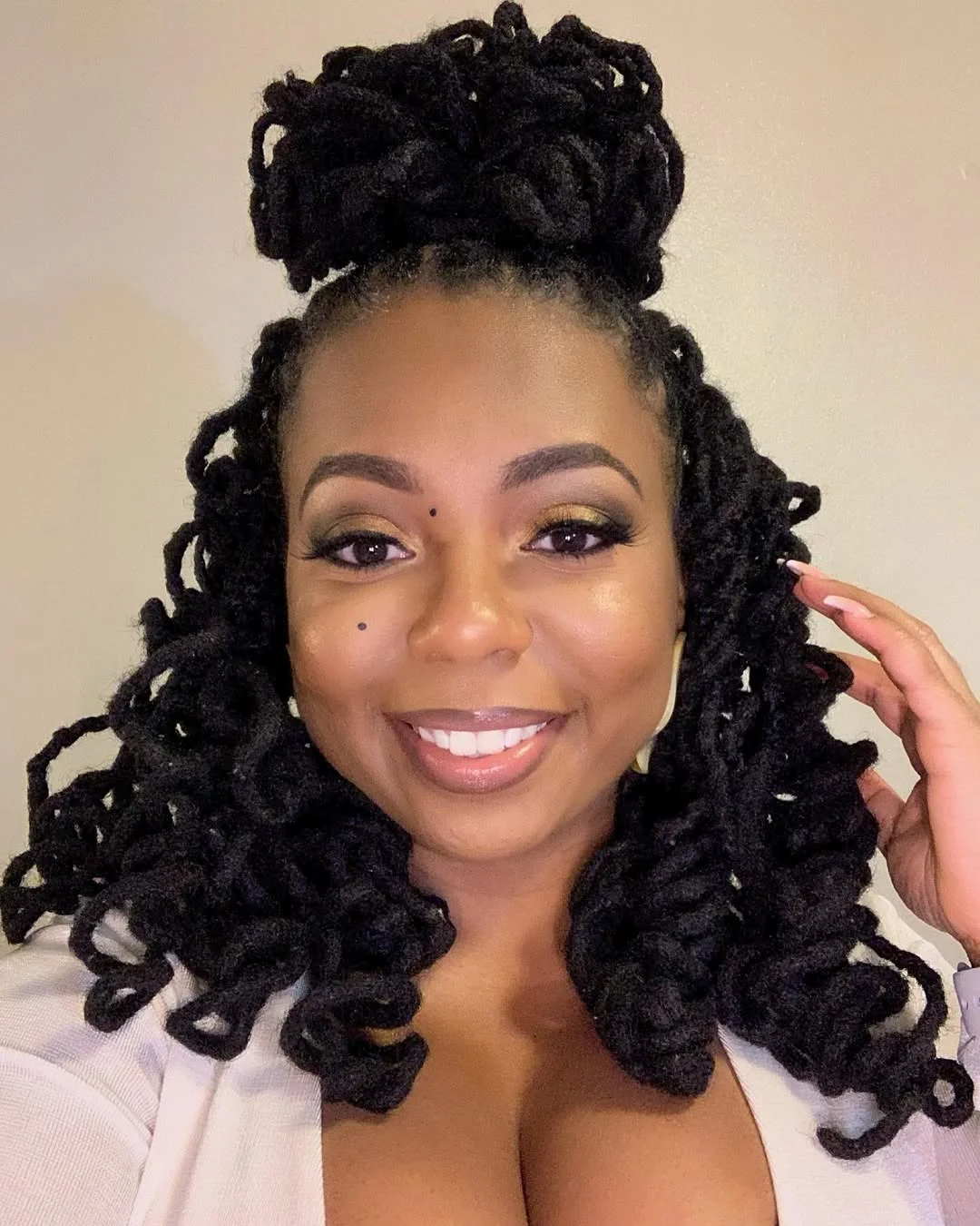 sleek summer hairstyle black women 2026 Half-Up Butterfly Locs With Soft Glam Volume