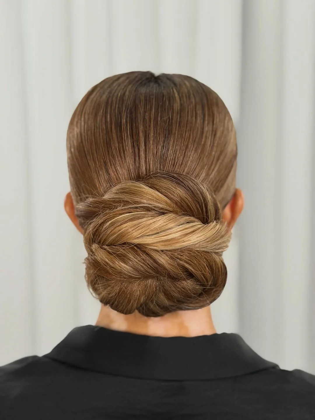 sleek summer updo hairstyles 2026 Minimal Sleek Low Roll With Honey Blonde Dimension