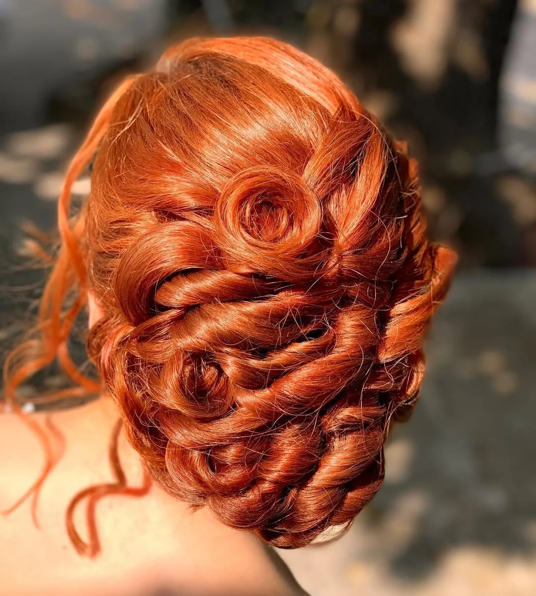 sleek summer updo hairstyles 2026 Glossy Copper Twists With Romantic Sculpted Details