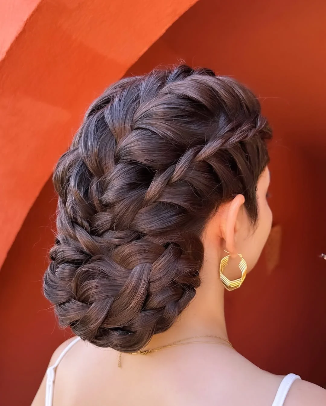 sleek summer updo hairstyles 2026 Structured Braided Crown With Deep Brunette Dimension
