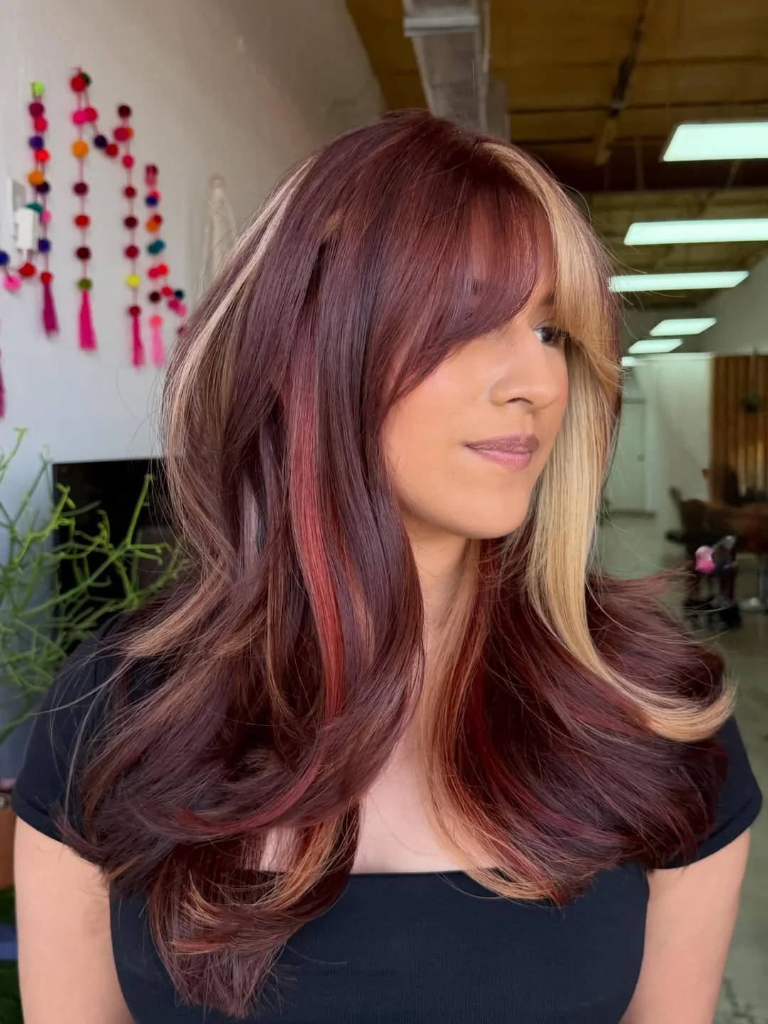 stunning summer hairstyles ideas 2026 Cherry Cola Layers with Bold Blonde Money Piece