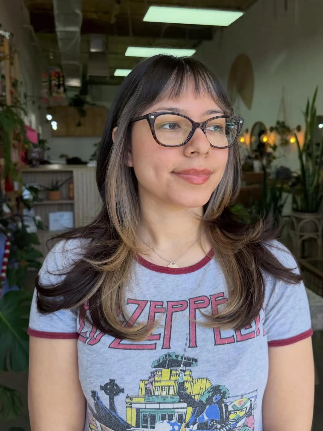 stunning summer hairstyles ideas 2026 Soft Layered Flip with Wispy Bangs