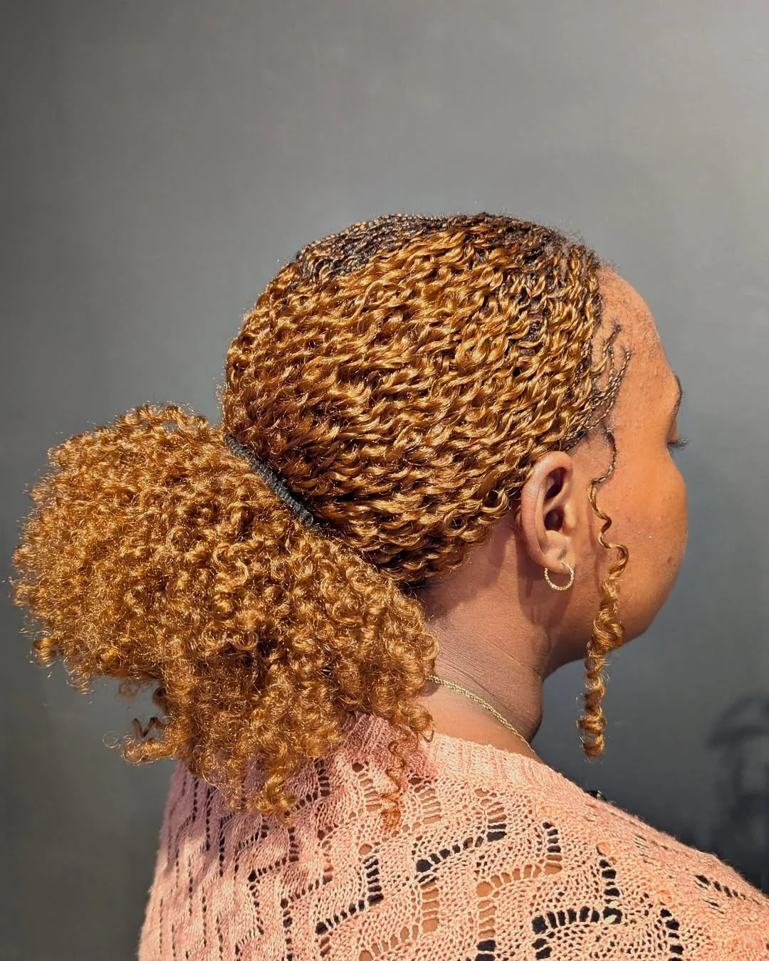 stunning summer hairstyles ideas 2026 Golden Curly Ponytail with Sleek Texture Play