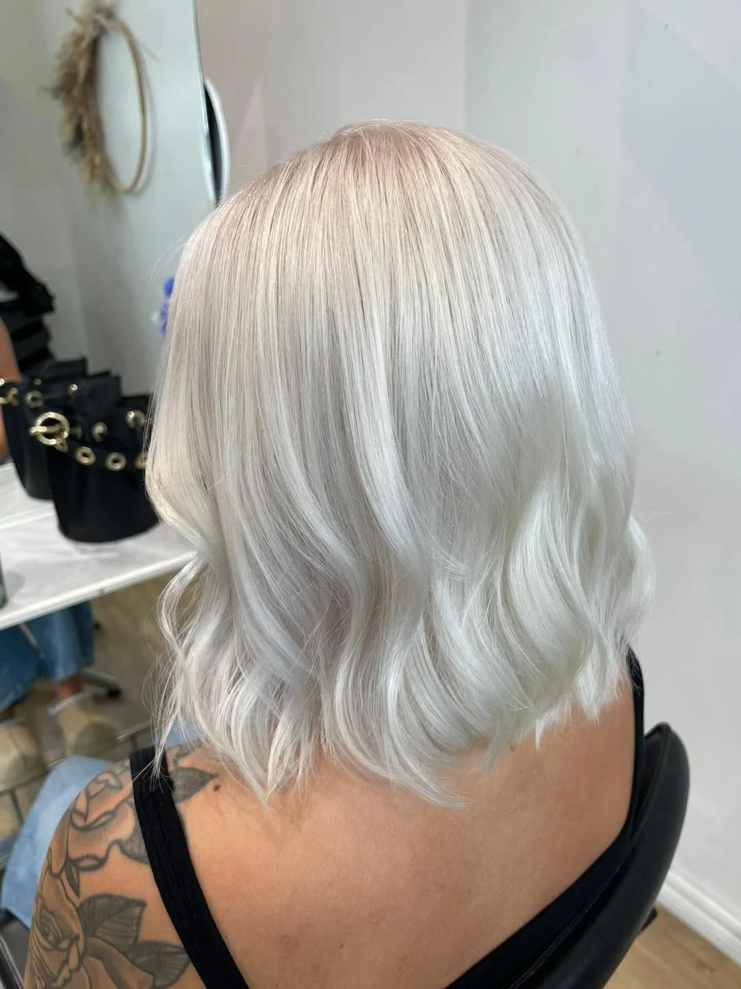 stunning summer hairstyles ideas 2026 Soft Pearl Blonde Wavy Bob